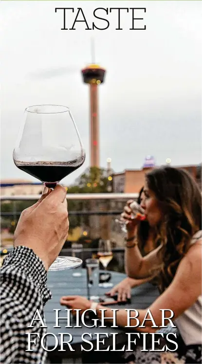  ?? Robin Jerstad / Contributo­r ?? The view of Hemisfair Park and the Tower of the Americas is a draw at the Fairmount Rooftop Oyster Bar.