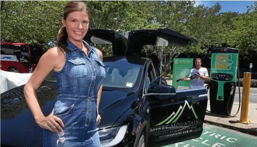 ?? PHOTO: ANNA ROGERS ?? SMARTPHONE ON WHEELS: Sharon and Gene Salvestrin charge their Tesla Model X in Cairns.
