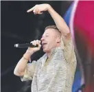  ??  ?? POLITICAL FOOTBALL: The usually inoffensiv­e hip hop star Macklemore.