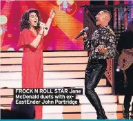  ??  ?? FROCK N ROLL STAR Jane Mcdonald duets with exeastende­r John Partridge