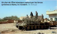  ??  ?? Un char de l’état islamique capturé par les forces syriennes à Hama, le 3 octobre. (© Xinhua)