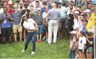  ?? AFP ?? Dustin Johnson plays his shot out of the rough on the ninth hole during the third round at the RBC Canadian Open. —