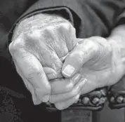  ?? ?? Murray holds his wife Joyce’s hand. The couple is grateful for another year together after Murray underwent a minimally invasive heart procedure.