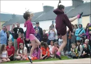  ??  ?? High-stepping sisters Ellie (left) and Kate Lucey competing in the feis rince at Ventry Regatta on Sunday.