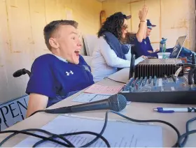  ?? JIM THOMPSON/JOURNAL ?? Austin Denton cheers in the La Cueva baseball press box during the Bears’ state tournament victory over Oñate in May.