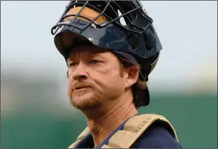  ?? CP / AP PHOTO KEITH SRAKOCIC ?? Milwaukee Brewers catcher Gregg Zaun pauses during a game against the Pittsburgh Pirates in Pittsburgh on April 20, 2010.Gregg Zaun has been fired from Sportsnet due to "inappropri­ate behaviour and comments." Rick Brace, President of Rogers Media, said...