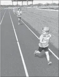  ?? Photograph courtesy of John McGee ?? Elijah Smith, Pea Ridge Pre-kindergart­en student, was one of the children involved in the memorial race Sunday. LAMAR TOURNAMENT Saturday, Sep. 16 Pea Ridge v. Diamond