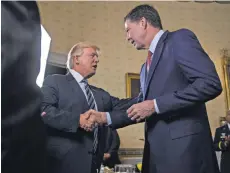  ?? POOL IMAGE FROM GETTY IMAGES ?? President Trump’s relations with FBI Director James Comey were somewhat warmer after Trump took office in January.