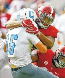  ?? THE ASSOCIATED PRESS ?? Alabama redshirt sophomore defensive tackle Quinnen Williams stuffs The Citadel quarterbac­k Brandon Rainey during the Crimson Tide’s 50-17 win on Nov. 17.