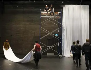  ??  ?? Staff prepare finishing touches to the main theatre ahead of its first play, The Wedding Party.