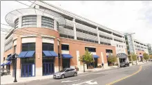  ??  ?? A parking garage at 276 Winchester Ave. in New Haven, listed as owned by Fenix I LLC, was included in the exemption requests.