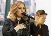  ?? HEIDI GUTMAN/NBC VIA THE ASSOCIATED PRESS ?? Adele performs on the Today show on Wednesday to promote her latest CD, 25. Experts and legions of fans agree that in the age of auto-tune, Adele’s natural voice is very refreshing.