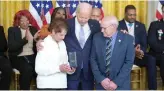  ?? Tribune News Service ?? President Joe Biden awards the Presidenti­al Citizens Medal to U.S. Capitol Police Officer Brian D. Sicknick whose parents Charles and Gladys Sicknick accepted on his behalf during a ceremony Friday in Washington, D.C., marking the second anniversar­y of the Jan. 6 attack on the U.S. Capitol.