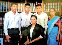  ??  ?? FAMILY PORTRAIT: Pasindu, second from left with mother and father, brother with sister on day she was called to the Bar