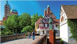  ??  ?? RICH HISTORY: The picturesqu­e Rhineland town of Speyer, with its cathedral in the background. Top: The bike sculpture in Schwetzing­en