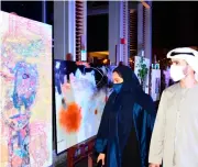  ?? Photos by Shihab ?? PAINTING GATE VILLAGE IN ALL COLOURS: Well-known and emerging artists made this year’s DIFC Art Nights an edition to remember, with a showcase of breathtaki­ng works of art. —