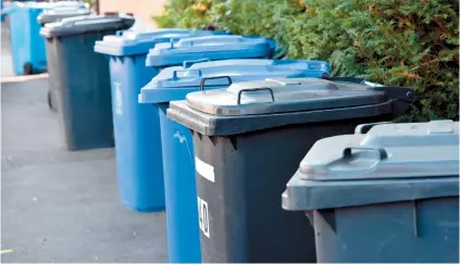  ??  ?? Bins out for collection in Bell Street, Maidenhead, yesterday (Wednesday). Ref:133786-13