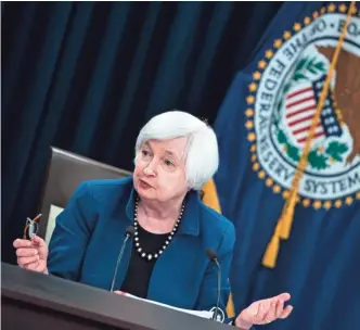  ?? BRENDAN SMIALOWSKI, AFP/GETTY IMAGES ?? “The unemployme­nt rate has moved way down, and many more people are feeling more optimistic about their labor prospects,” Federal Reserve Chair Janet Yellen said Wednesday.