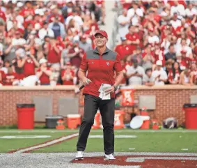  ?? BRYAN TERRY/THE OKLAHOMAN ?? OU coach Brent Venables talks to the crowd during halftime of the Sooners' spring game on April 23 at Gaylord Family-Oklahoma Memorial Stadium in Norman.