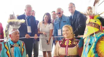  ?? AMY SHORTELL/THE MORNING CALL ?? At the Wind Creek Casino opening, Tribal Chair Stephanie Bryan cuts the ribbon among local, state and tribal officials. Wind Creek is the gambling/hospitalit­y arm of Alabama’s Poarch Band of Creek Indians.