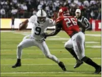  ?? MEL EVANS — THE ASSOCIATED PRESS ?? Penn State quarterbac­k Trace McSorley (9) tries to get away from Rutgers linebacker Deonte Roberts (26) during last Saturday’s game.