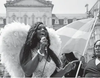  ?? KIM HAIRSTON/BALTIMORE SUN ?? Iya Dammons, founder and executive director of Baltimore Safe Haven, speaks Saturday during the second annual Black Trans Lives Matter rally and march near City Hall.