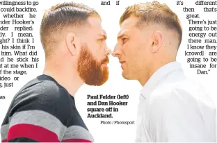  ?? Photo / Photosport ?? Paul Felder (left) and Dan Hooker square off in Auckland.