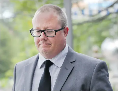  ?? DAN JANISSE ?? Andrew Cowan, 47, leaves Superior Court of Justice in Windsor on Tuesday after the opening day of his first-degree murder trial in connection with the death of Edward Witt in an October 2012 crash in Leamington.