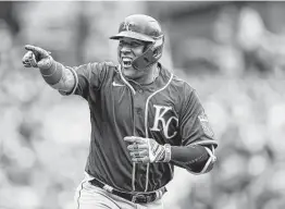  ?? Ron Schwane / Getty Images ?? Salvador Perez, above, eclipsed Johnny Bench’s record for most home runs by a catcher in a season with his 46th in the opener as the Royals finished off a doublehead­er sweep of the Indians on Monday.