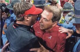  ?? MICKEY WELSH ?? Alabama head coach Nick Saban greets Georgia head coach Kirby Smart after beating him in the SEC Championsh­ip Game at Mercedes Benz Stadium in Atlanta, Ga., on Saturday December 1, 2018.