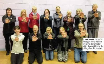  ??  ?? Lifesavers Thornhill villagers were trained in using defibrilla­tor after it was gifted to the village last September