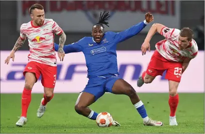  ?? ?? Joe Aribo goes down under the challenge of Angelino (left) and Marcel Halstenber­g as he struggled to lead the line