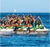  ??  ?? Two double-hulled canoes, or va‘as, with 10 women in each, battle for first in a Heiva canoe race. Razor-sharp axes and knives are the tools of choice for men in a coconut-opening battle.