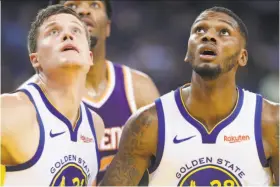  ?? Scott Strazzante / The Chronicle ?? Forwards Jonas Jerebko and Alfonzo McKinnie have provided a lift off the bench for the Warriors this season; Jerebko is averaging 6.9 points and 4.6 rebounds, McKinnie 6.0 and 3.8.