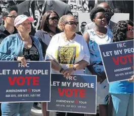  ?? CARLINE JEAN/SOUTH FLORIDA SUN SENTINEL ?? A federal judge in Tallahasse­e will decide whether more than 400,000 former felons in Florida can vote, even if they can’t afford to pay the fines and fees issued as part of their sentences.