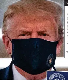  ??  ?? DONALD Trump is pictured in a mask k for the first time in public – despite e his previous mockery of them. The mask carried his seal. Mr Trump was visiting a hospital in Maryland. .