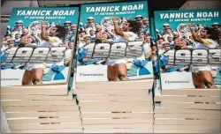  ?? ?? Books on Yannick Noah and his triumph at the French Open in 1983 were on sale in May at Roland Garros in Paris. To the world, Noah is the last Frenchman to win his country’s Grand Slam tournament, but in France, his legacy means much more.