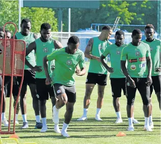  ?? Picture: AFP ?? HARD AT WORK: Nigeria players put through their paces during a training session at Essentuki Arena in southern Russia ahead of their clash against Iceland