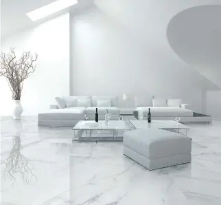  ?? IMAGES COURTESY OF CÉRAMIQUES PAVIGRÈS ?? Large glossy tiles like these, Ambte Varenna Carrara, with their tones of grey and white, result in a classic look that blends well with any decor.