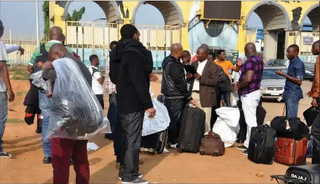  ?? Kolawole Alli ?? Deported Nigerians from Norway, Sweden, Denmark and Finland speaking with journalist­s on their arrival at the Murtala Muhammed Internatio­nal Airport, Ikeja in Lagos...yesterday
