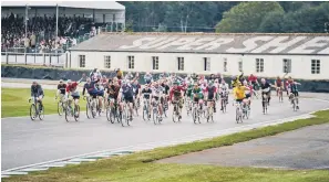  ?? PHOTO: DOMINIC JAMES ?? Eroica Britannia cyclists on a lap of the motor circuit