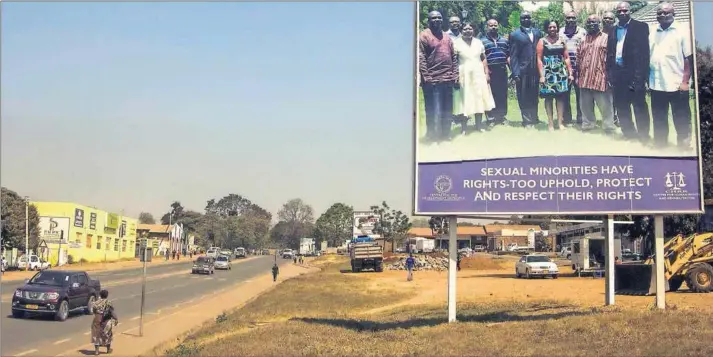  ?? Photo: Amos Gumulira/AFP ?? Loud and clear: A billboard in Lilongwe, the capital of Malawi, urges respect for the rights of sexual minorities — but this is easier said than done.