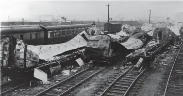  ?? Author’s Collection ?? In the aftermath of the Luftwaffe raid of 24 November 1940, wreckage of destroyed Great Western coaching stock is found in Dr Day’s Siding, their wooden bodies burned and lost. This is at the triangle of lines less than hlaf a mile east of Temple Meads station, these carriage sidings effectivel­y on the inside of the west-to-north curve taken to reach Dr Days Junction and Filton, and variously east from there for Stoke Gifford and Badminton, straight ahead for the Severn Tunnel, or west for Henbury and Avonmouth. The distant wagons in view are in Kingsland Road sidings, which are south of the triangle’s west-to-east spur, the core Bristol to Bath main line.
