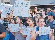  ?? [RICHARD VOGEL/THE ASSOCIATED PRESS] ?? Supporters of the Deferred Action for Childhood Arrivals, or DACA, chant slogans and hold signs while joining a Labor Day rally in Los Angeles on Monday.