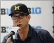  ?? ANNIE RICE — THE ASSOCIATED PRESS ?? Jim Harbaugh and Michigan are looking to beat rival Ohio State this weekend.