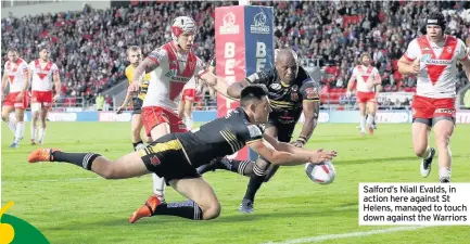  ??  ?? Salford’s Niall Evalds, in action here against St Helens, managed to touch down against the Warriors