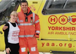  ??  ?? ●● Midwife Hayley Morris with air ambulance paramedic Matt Syrat