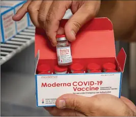  ?? WAYNE TILCOCK — UC DAVIS ?? Vials of the Moderna COVID- 19 vaccine at UC Davis Health were received this week and are now being administer­ed.