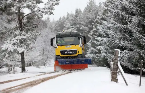  ?? Picture: Peter Jolly ?? „ Snowplough­s were back on the roads near Inverness yesterday as weather warnings for drivers were extended.