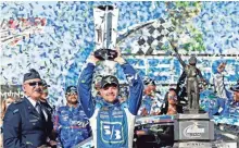  ??  ?? Ricky Stenhouse Jr. enjoys his first Cup win Sunday. He thanked girlfriend-driver Danica Patrick for her support.